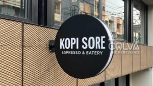 posisi signage toko baru